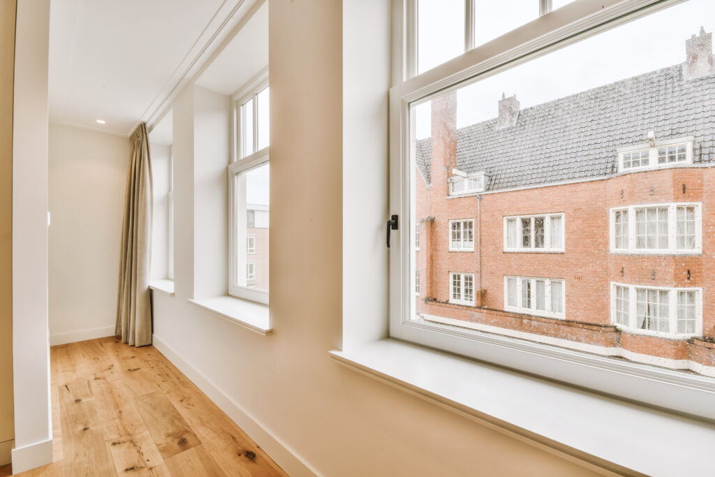 Empty room with picture window replacement